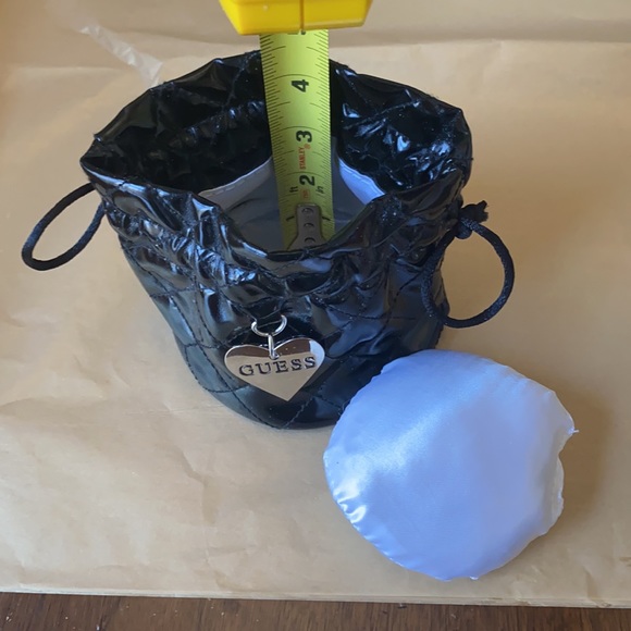 11:01  - 3/$25 Bundle Only GUESS Patent Drawstring Pouch - Picture 10 of 11